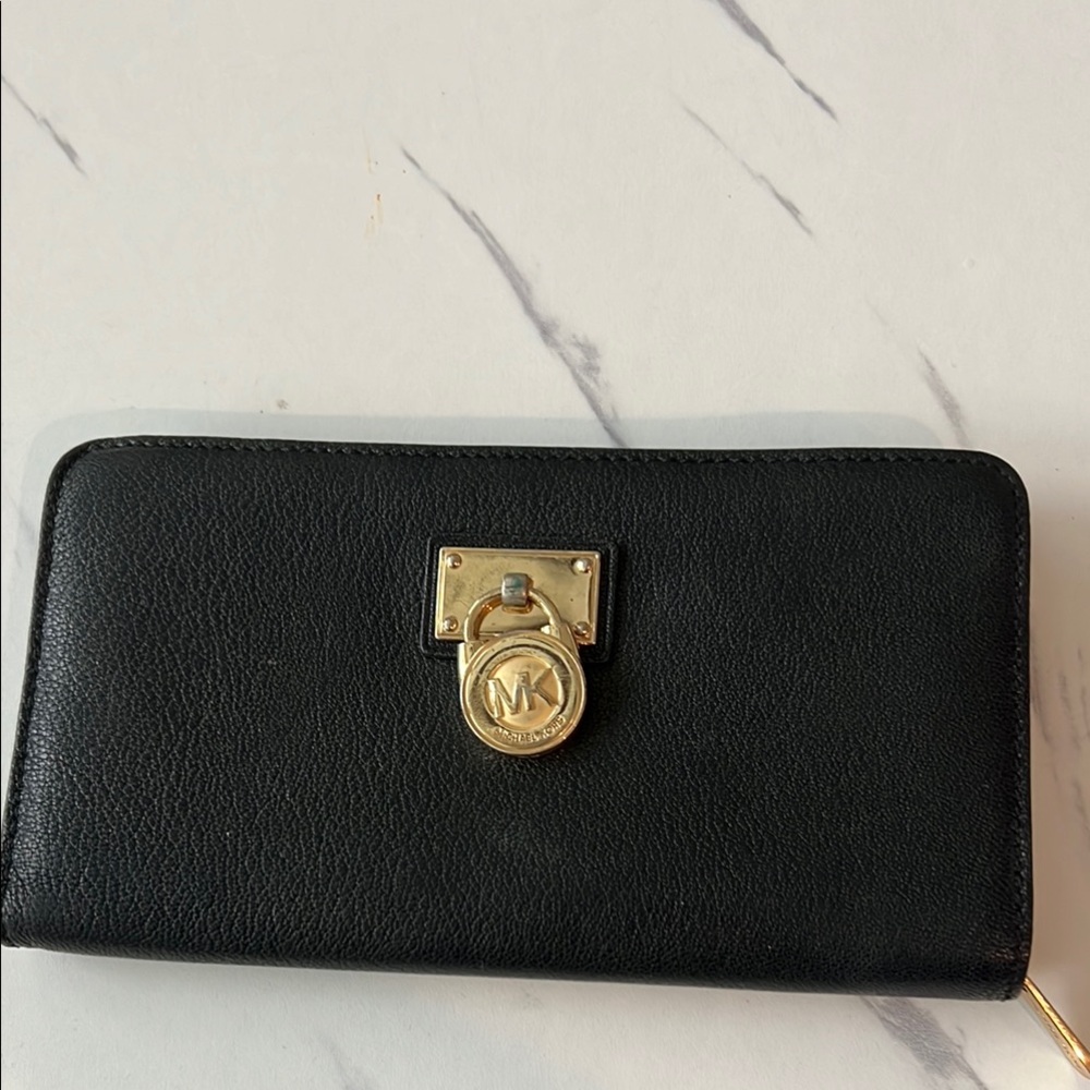 Michael Kors Black and Gold Wallets Sleek Design